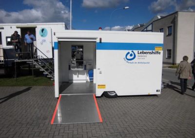 Behindertentoilette absenker